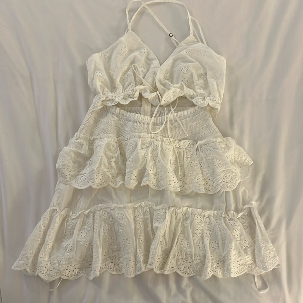 Eyelet mini summer dress. Looks like 2 pieces but it’s one